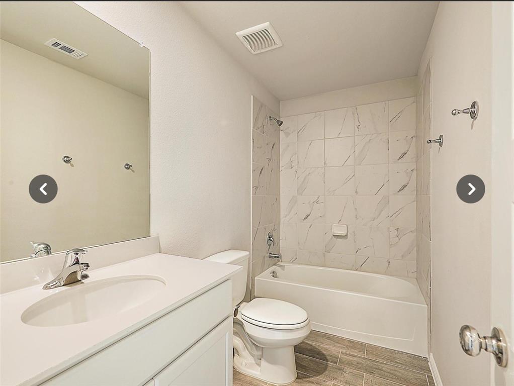14219 Aberavon Drive Pilot Point, TX 76258 - Photo 22 of 25 a bathroom with a sink toilet and shower
