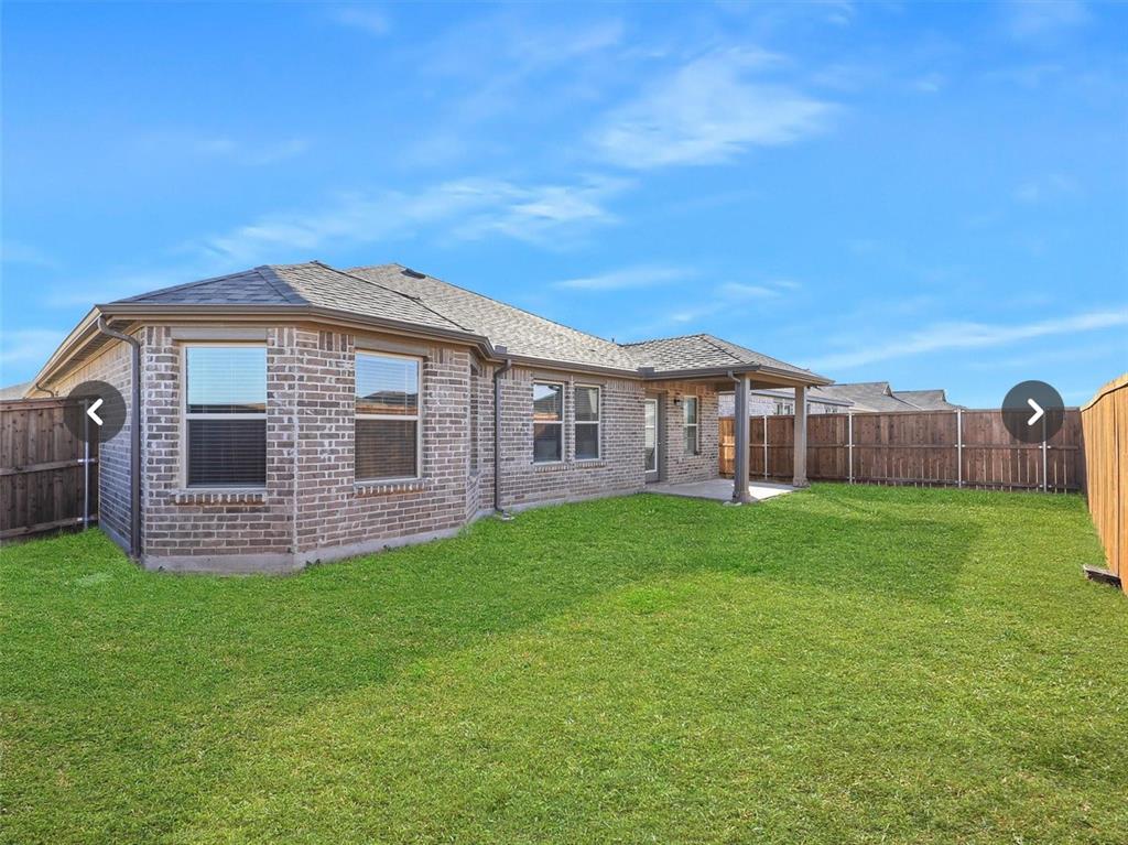 14219 Aberavon Drive Pilot Point, TX 76258 - Photo 25 of 25 a front view of a house with garden