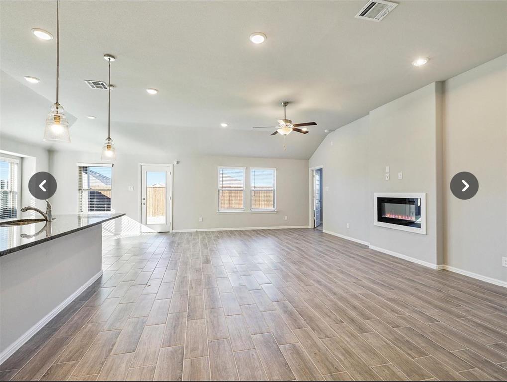 14219 Aberavon Drive Pilot Point, TX 76258 - Photo 9 of 25 a view of a room with window and wooden floor