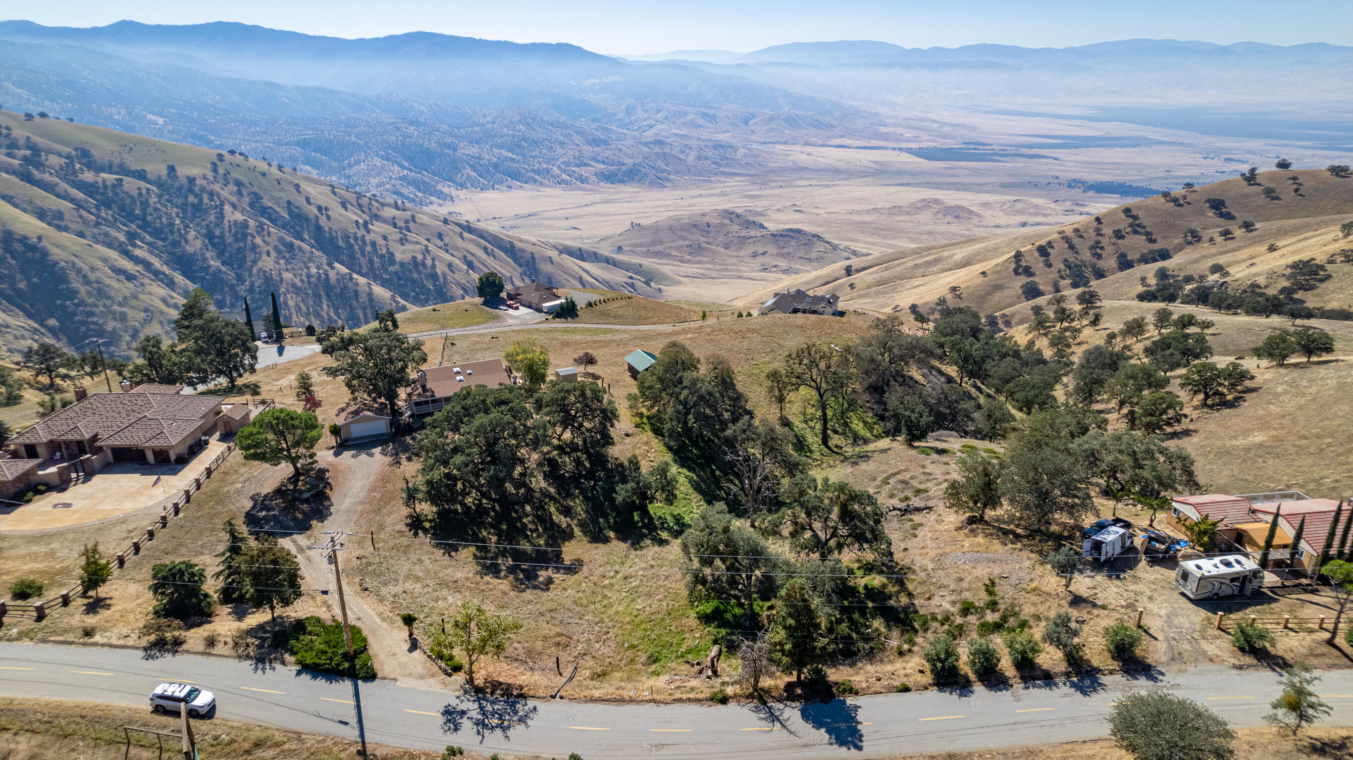 Percheron Place Tehachapi, CA 93561 - Photo 2 of 14 a view of a street with a mountain