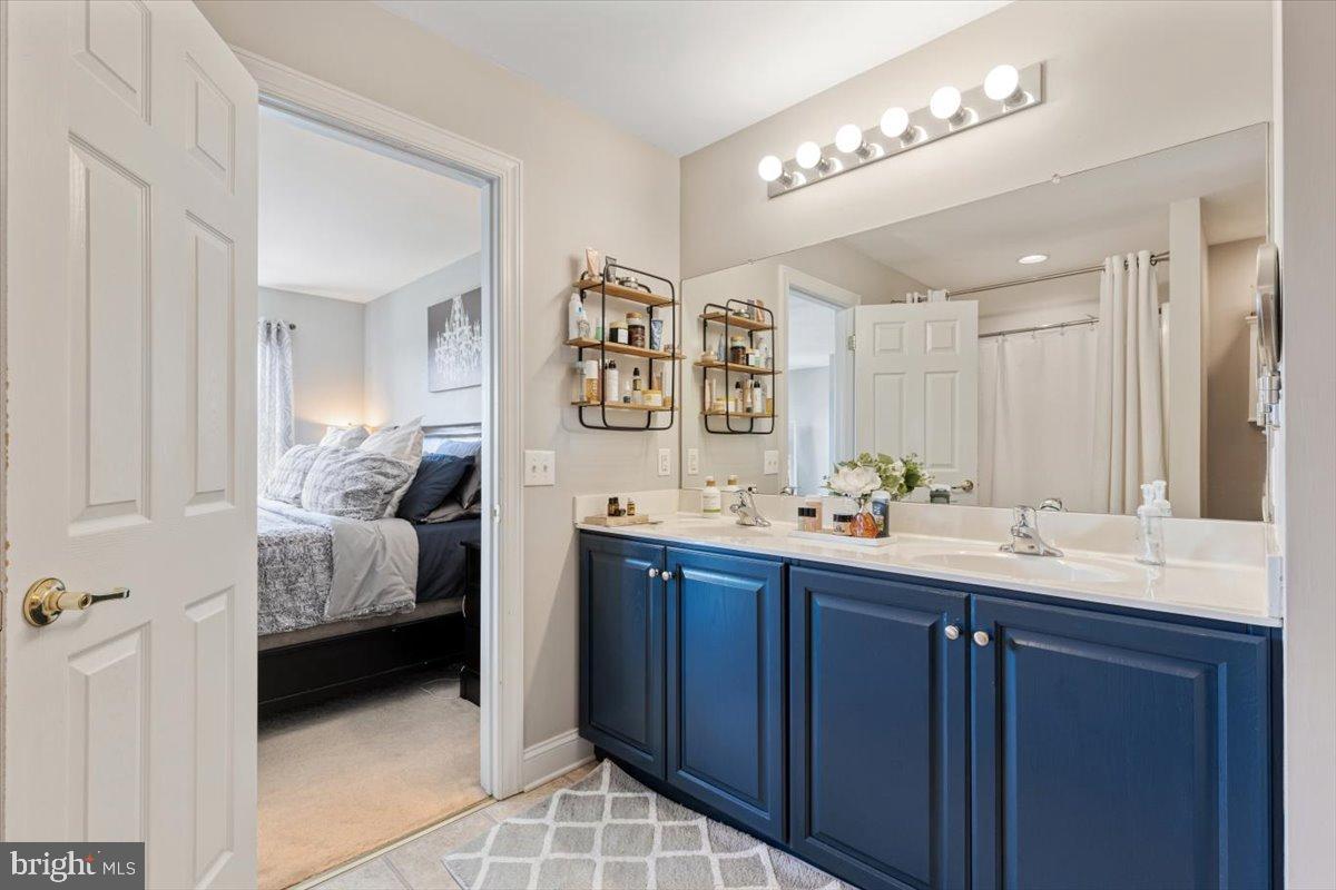 22 Sugar Maple Road Barto, PA 19504 - Photo 19 of 33 a en suite bathroom with a double vanity sink and a mirror