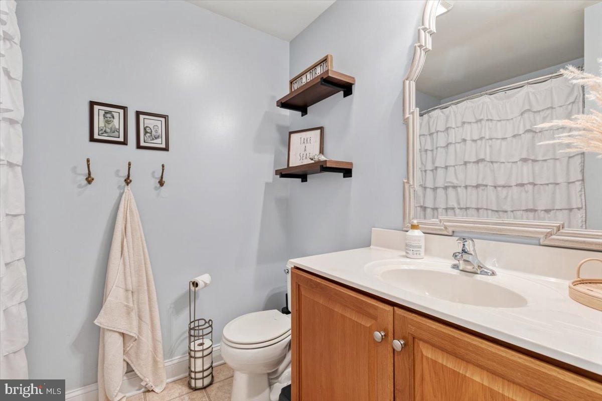 22 Sugar Maple Road Barto, PA 19504 - Photo 25 of 33 a bathroom with a sink a toilet and mirror