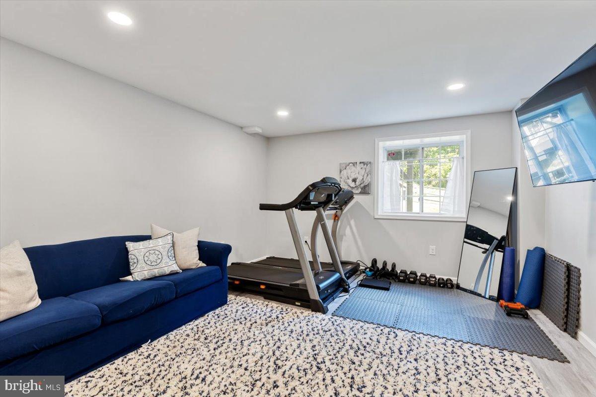 22 Sugar Maple Road Barto, PA 19504 - Photo 27 of 33 a living room with furniture a flat screen tv and a window