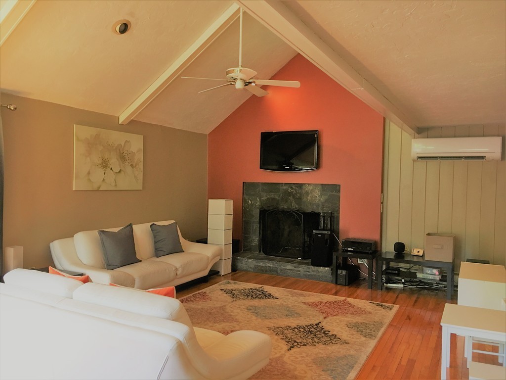 6 Dolan Road Millbury, MA 01527 - Photo 13 of 30 a living room with furniture and a fireplace