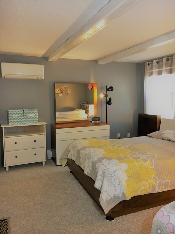 6 Dolan Road Millbury, MA 01527 - Photo 14 of 30 a bedroom with a bed and window