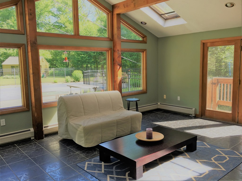 6 Dolan Road Millbury, MA 01527 - Photo 2 of 30 a living room with furniture and a window