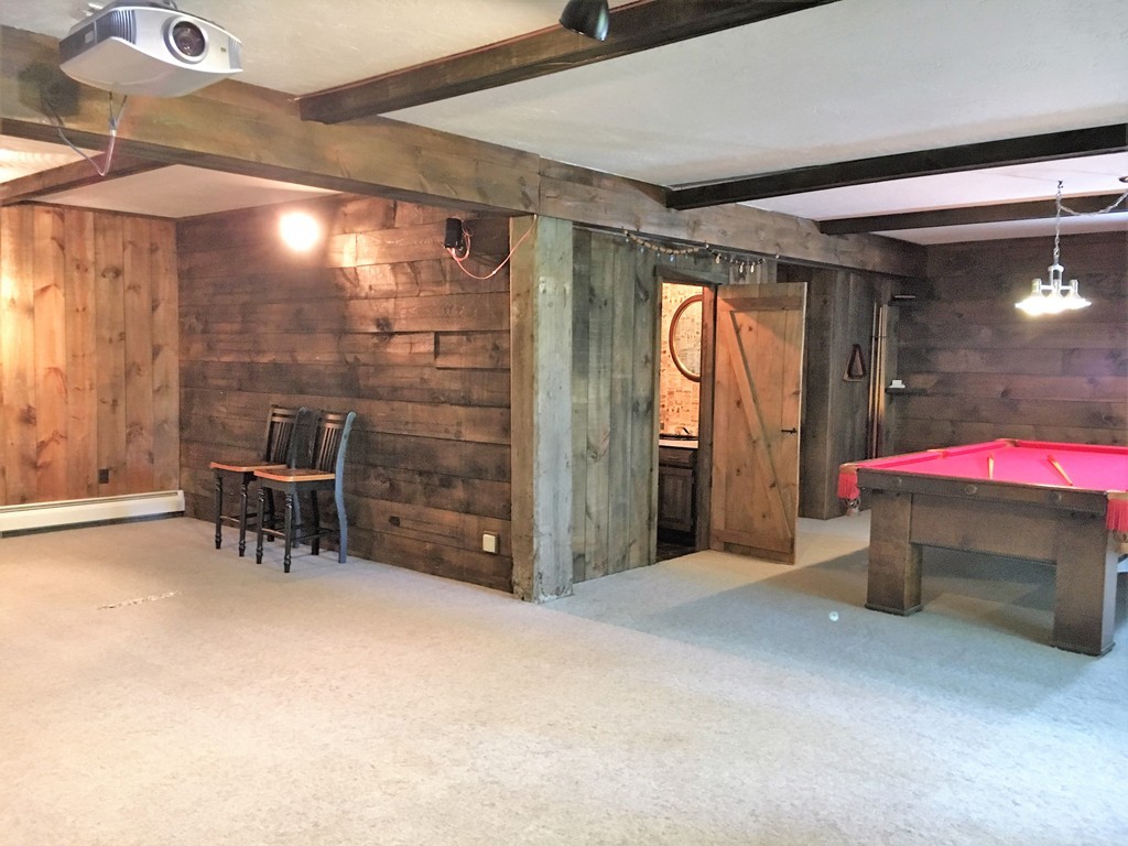 6 Dolan Road Millbury, MA 01527 - Photo 25 of 30 a view of an empty room with a fireplace