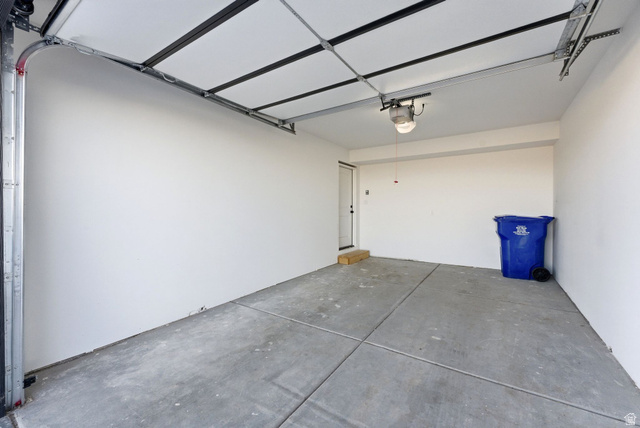 645 West 880th Street South Fillmore, UT 84631 - Photo 22 of 22 Spacious garage featuring concrete flooring and white painted walls