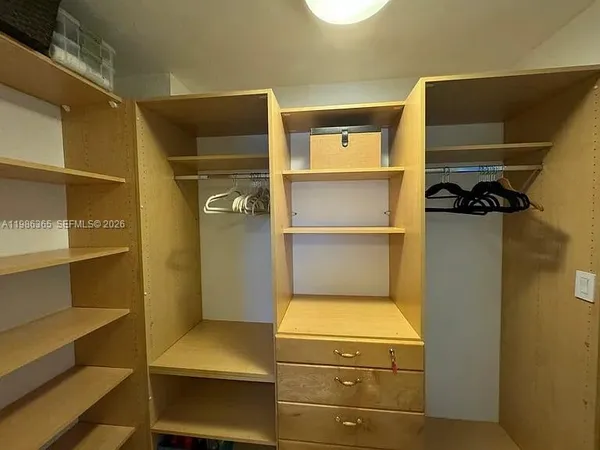 a storage room with washer and dryer