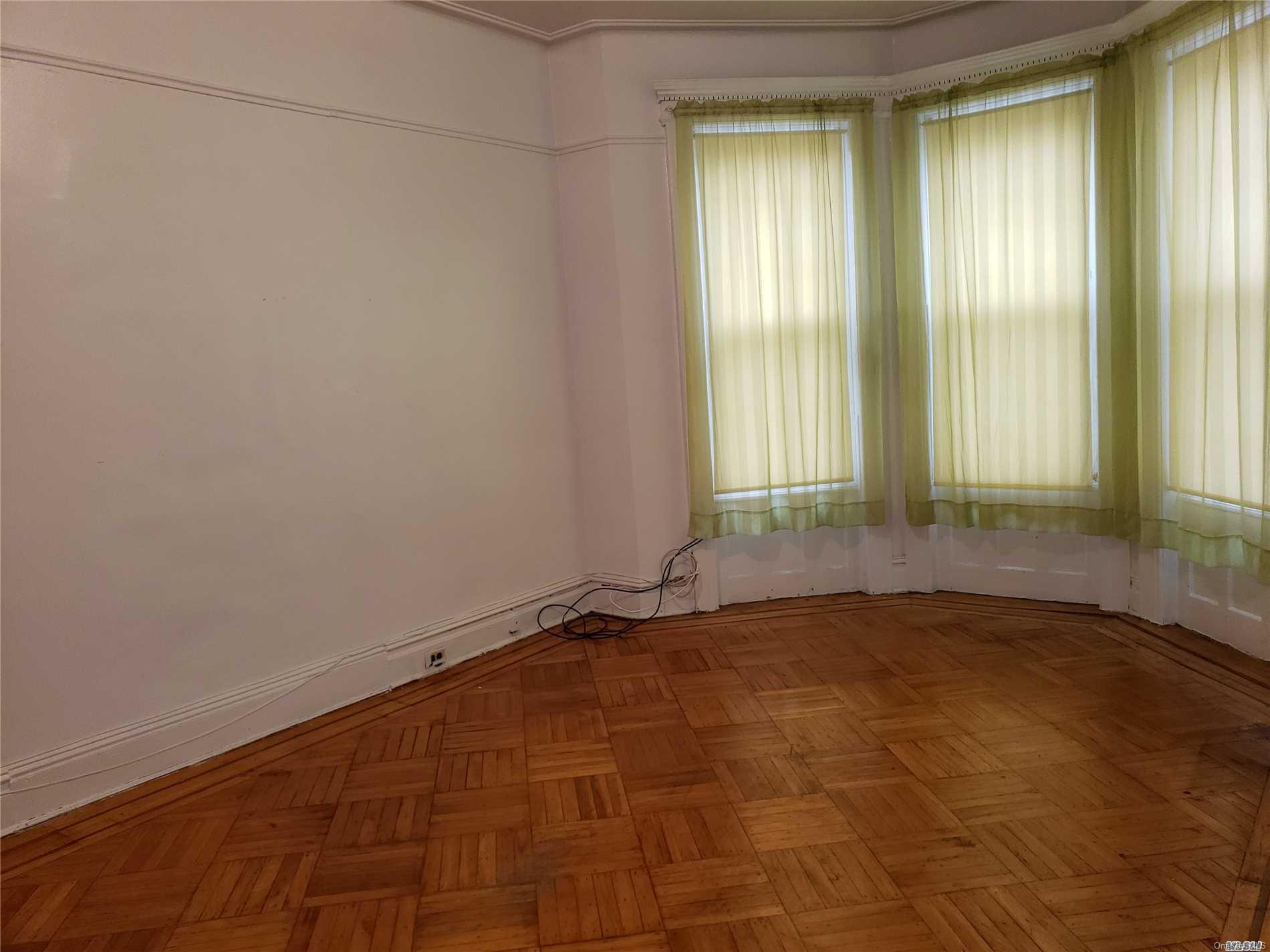 1425 Hancock Street Brooklyn, NY 11237 - Photo 17 of 20 a view of an empty room and window