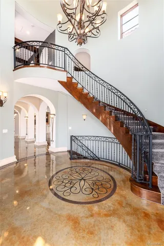a view of a livingroom with a furniture window and wooden floor