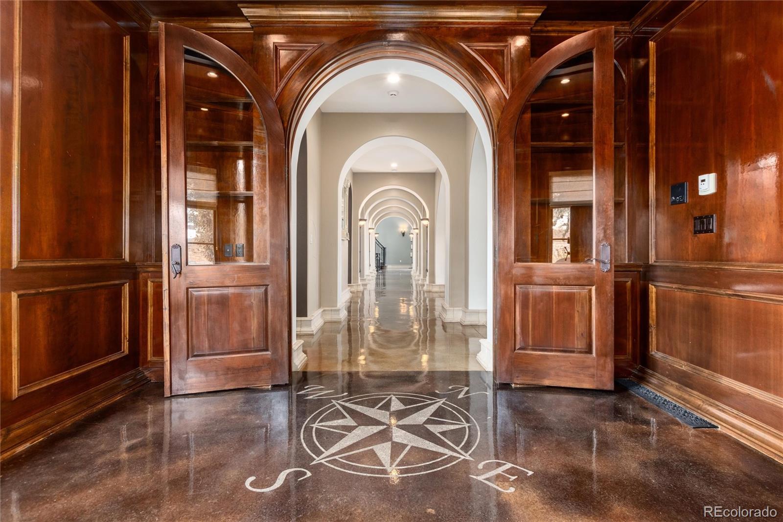 8417 High Ridge Court Castle Pines, CO 80108 - Photo 16 of 48 a view of a entryway with furniture