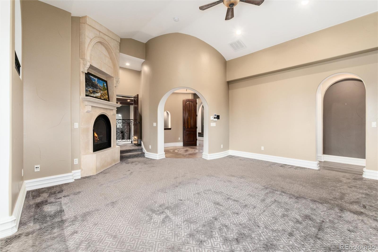 8417 High Ridge Court Castle Pines, CO 80108 - Photo 27 of 48 a view of a livingroom with a fireplace