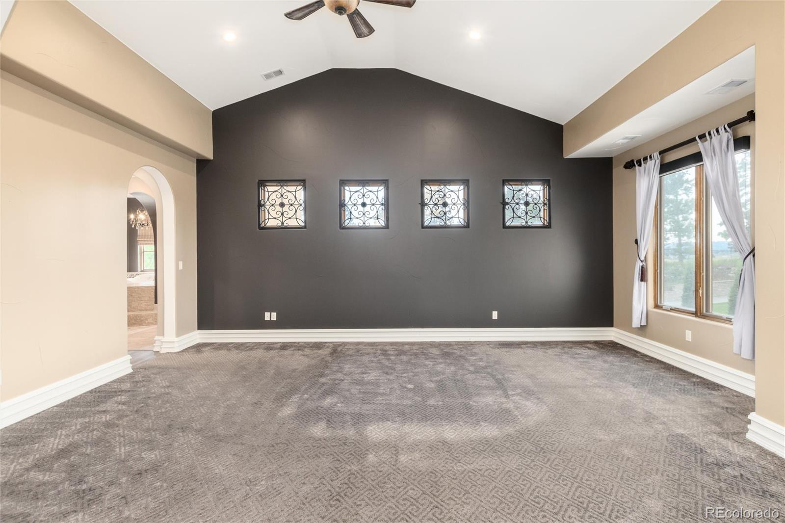 8417 High Ridge Court Castle Pines, CO 80108 - Photo 28 of 48 a view of an empty room with a window