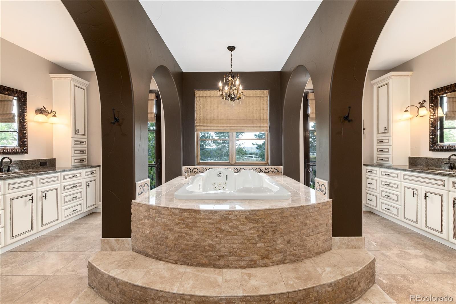 8417 High Ridge Court Castle Pines, CO 80108 - Photo 29 of 48 a view of a kitchen with granite countertop natural light