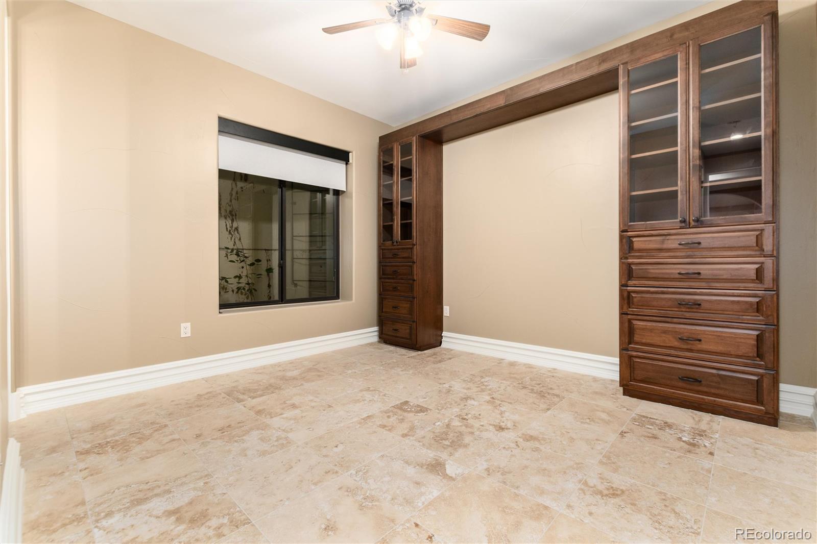 8417 High Ridge Court Castle Pines, CO 80108 - Photo 45 of 48 a view of an empty room with a window