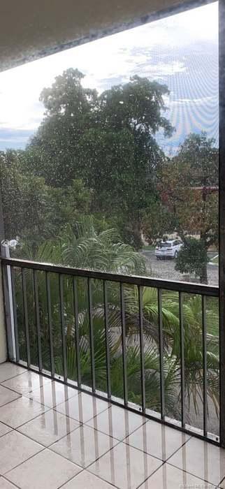 4176 Inverrary Drive, Unit 303 Lauderhill, FL 33319 - Photo 14 of 14 a view of a balcony with an outdoor space