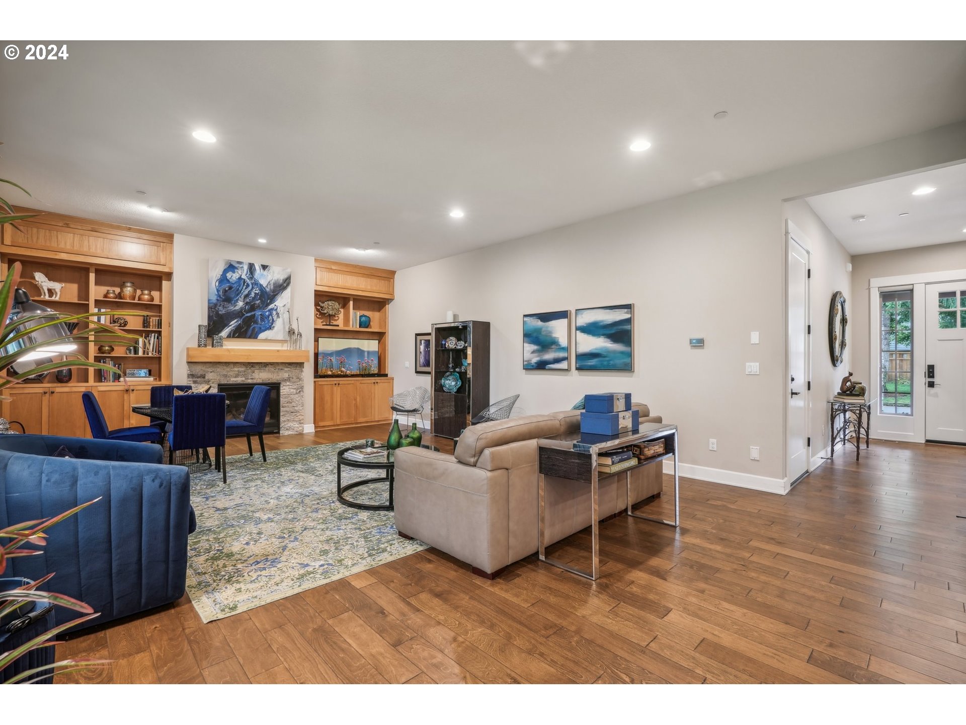 7606 Northwest Payne Street Camas, WA 98607 - Photo 11 of 38 a living room with furniture and a wooden floor