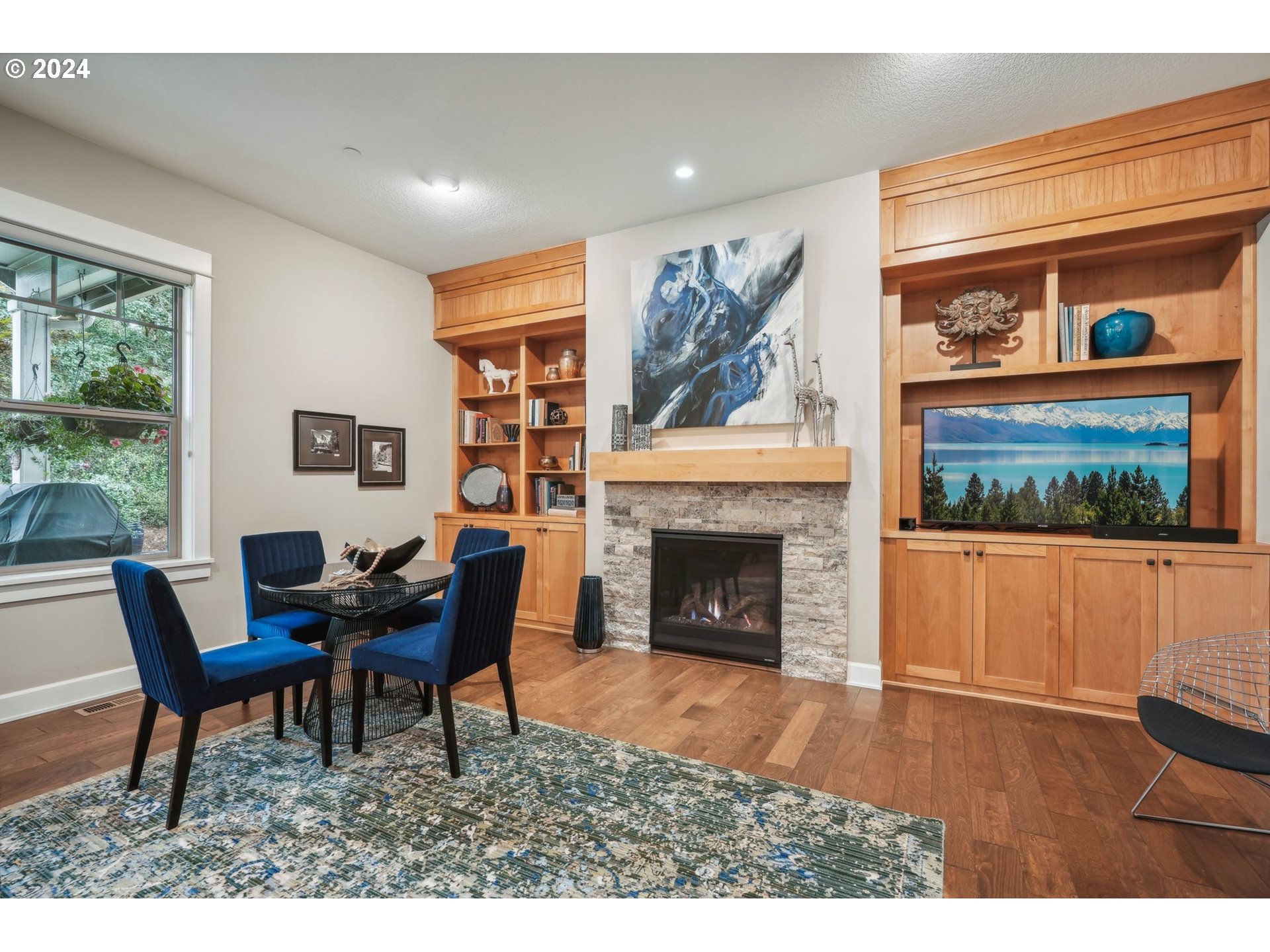 7606 Northwest Payne Street Camas, WA 98607 - Photo 12 of 38 a living room with furniture and a fireplace
