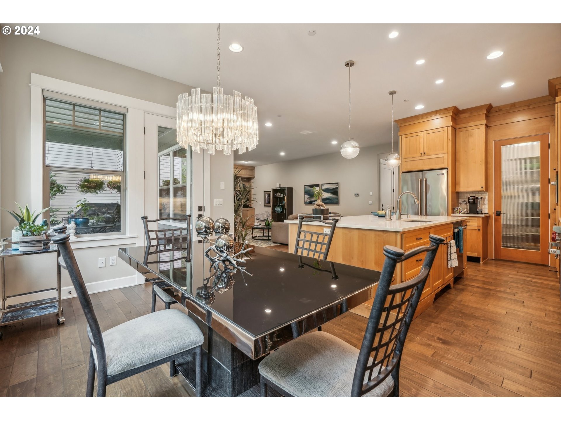 7606 Northwest Payne Street Camas, WA 98607 - Photo 15 of 38 a view of a dining room with furniture and wooden floor