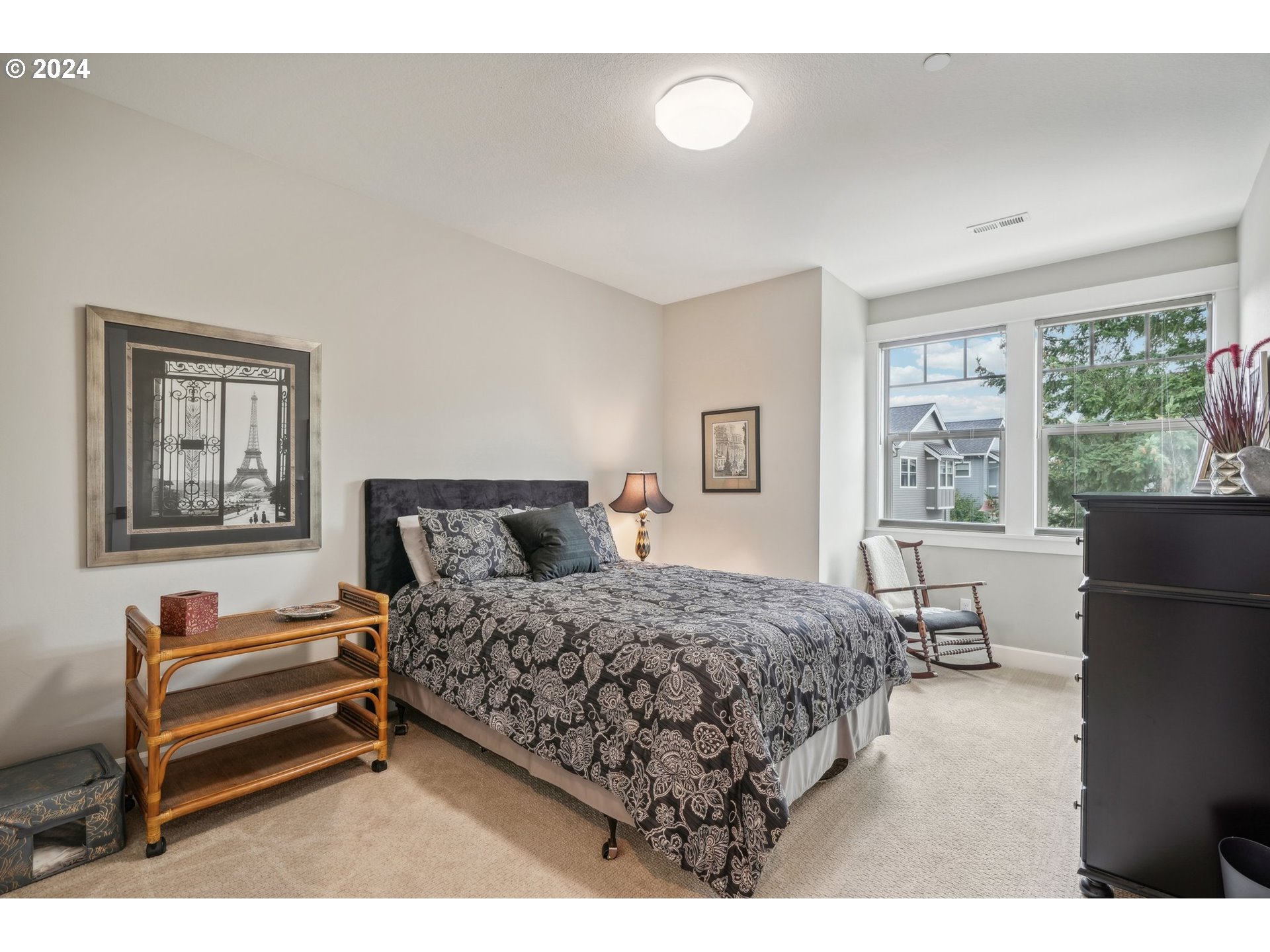 7606 Northwest Payne Street Camas, WA 98607 - Photo 24 of 38 a bedroom with a bed next to a window with outer view