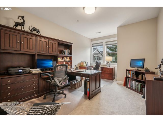 a workspace with furniture hardwood and a window