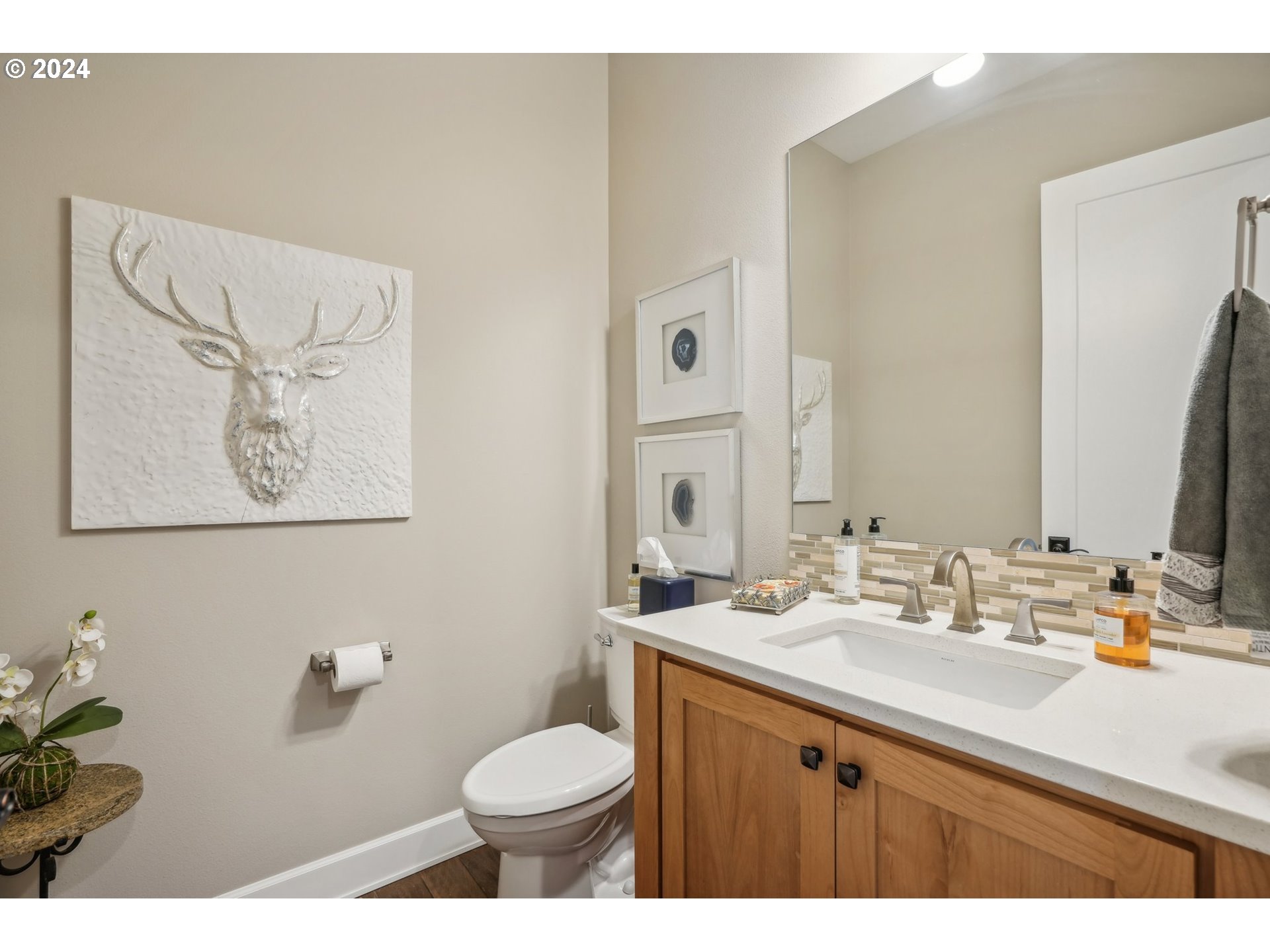 7606 Northwest Payne Street Camas, WA 98607 - Photo 27 of 38 a bathroom with a sink and a mirror