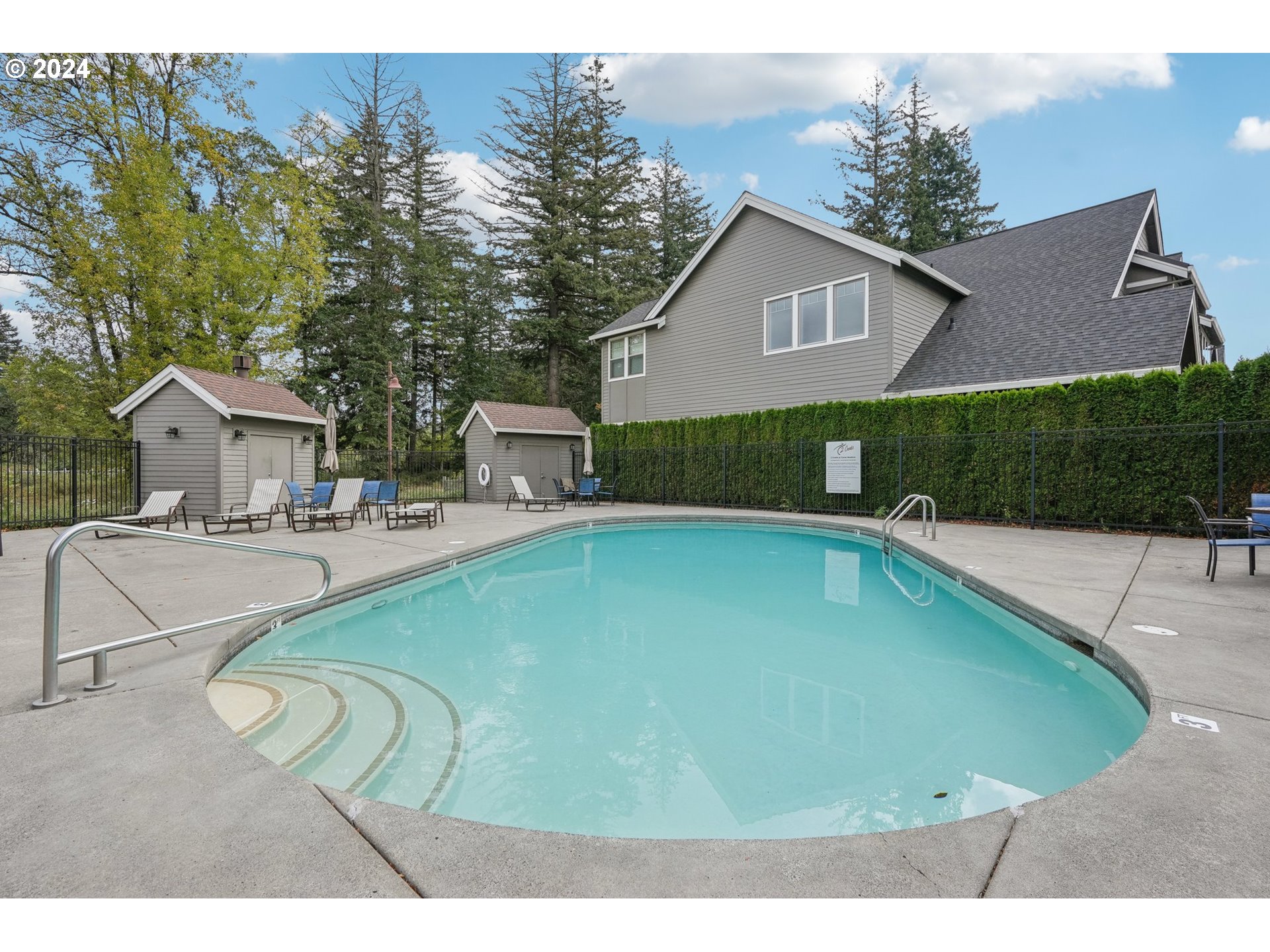 7606 Northwest Payne Street Camas, WA 98607 - Photo 3 of 38 a view of a house with swimming pool
