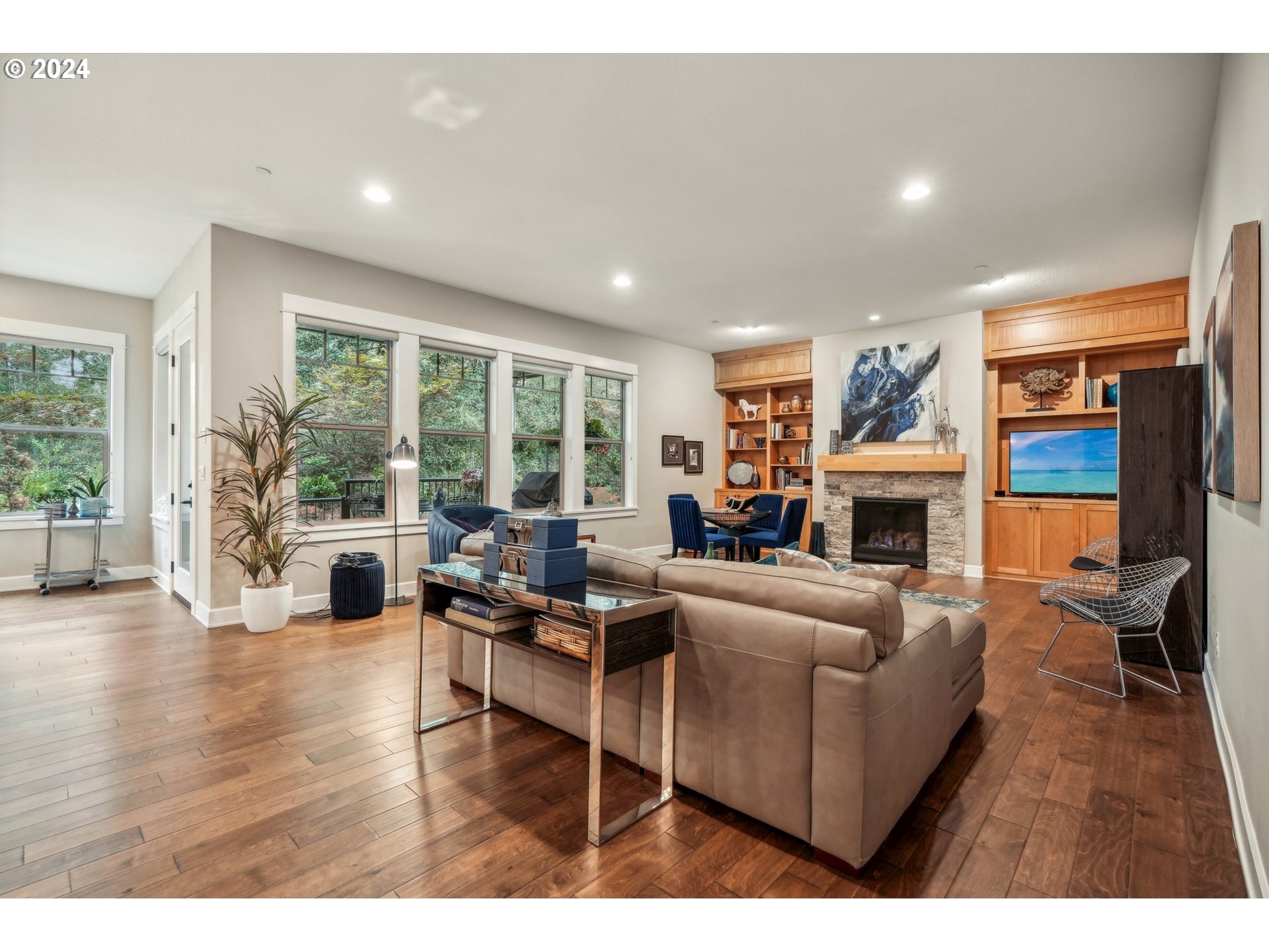 7606 Northwest Payne Street Camas, WA 98607 - Photo 10 of 38 a living room with fireplace furniture and a large window