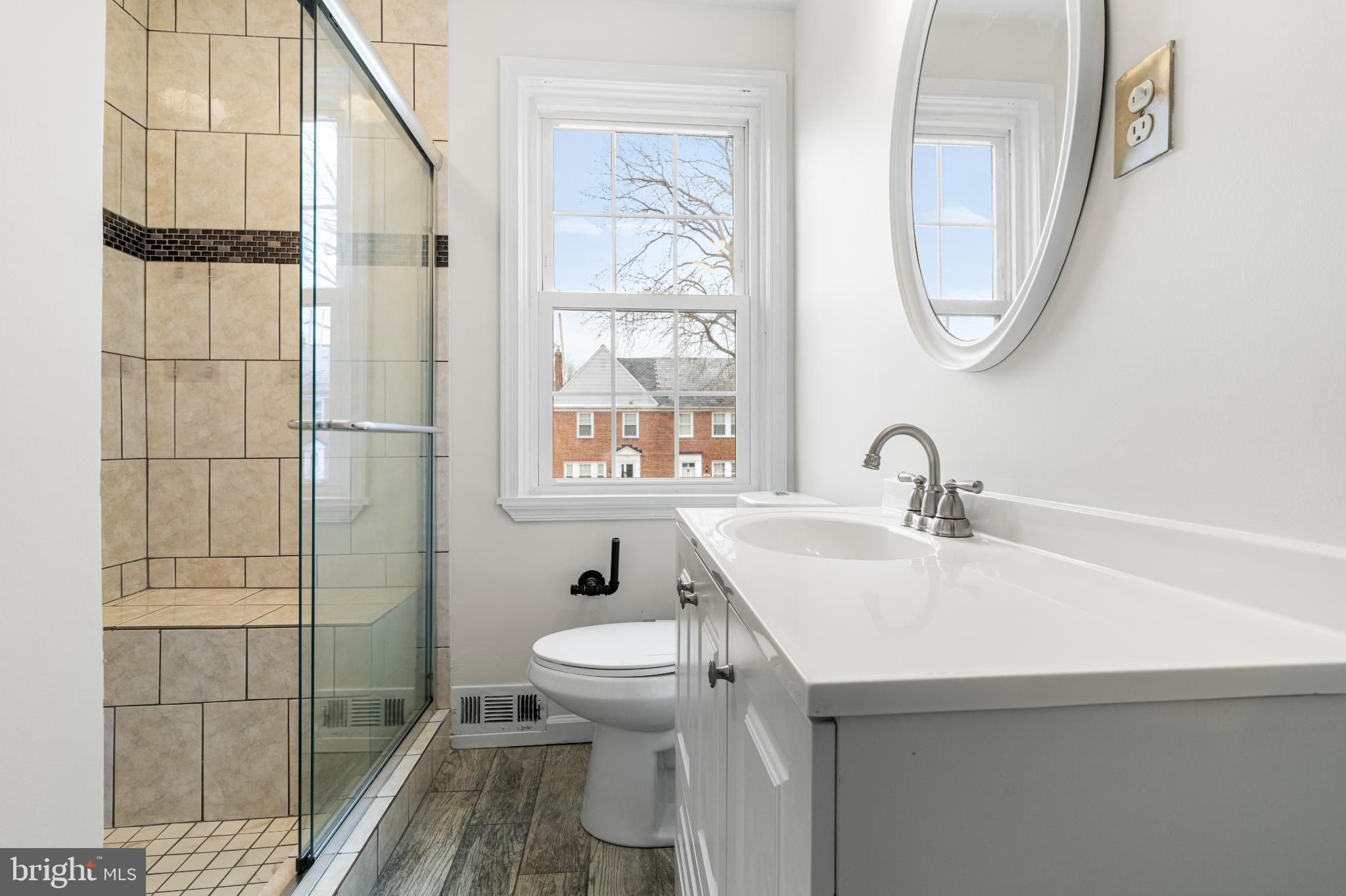 121 Hopkins Road Baltimore, MD 21212 - Photo 12 of 22 Bright and modern bathroom with natural light.