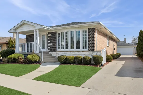 a view of a house with a garden