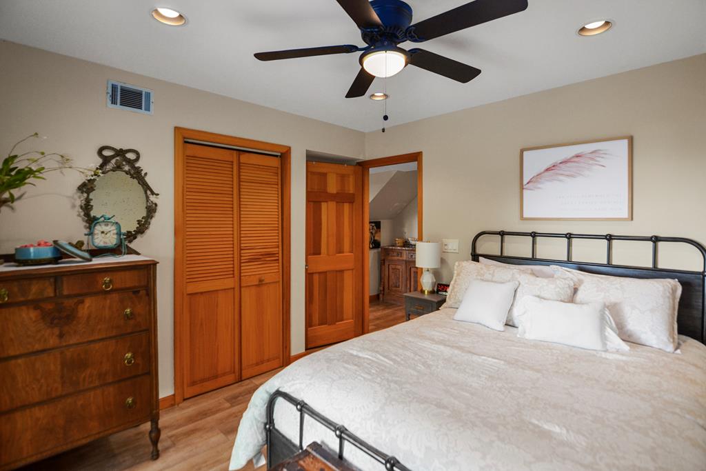 368 Green Ridge Mountain Blue Ridge, GA 30513 - Photo 54 of 64 a bedroom with a bed and a dresser