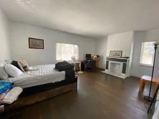 a bathroom with a toilet a sink and bathtub