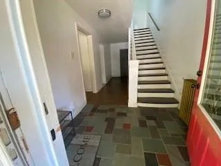 a view of an entryway with staircase