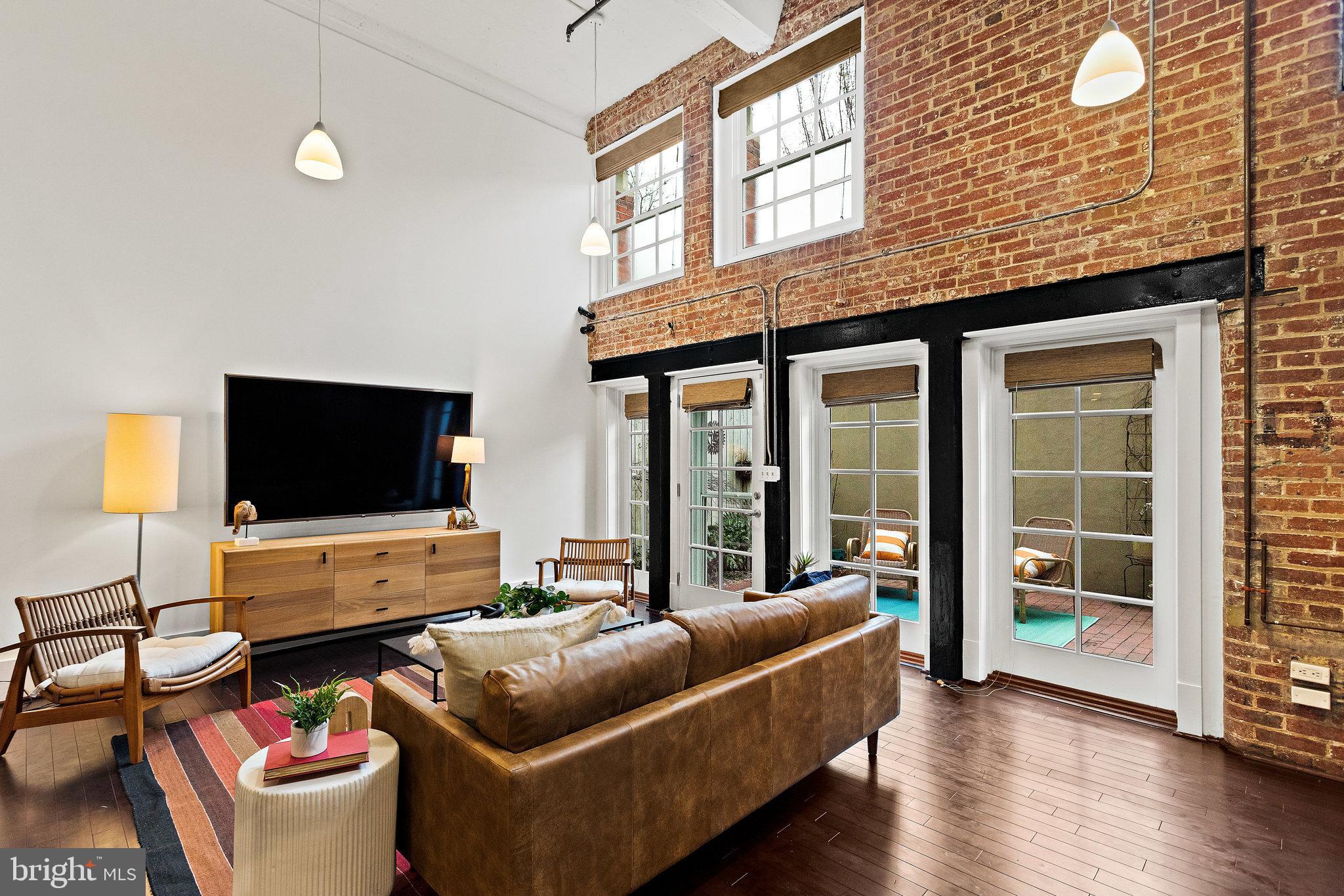 1315 Independence Avenue Southeast, Unit 8 Washington, DC 20003 - Photo 11 of 43 Hello movie nights! Large-screen TV conveys