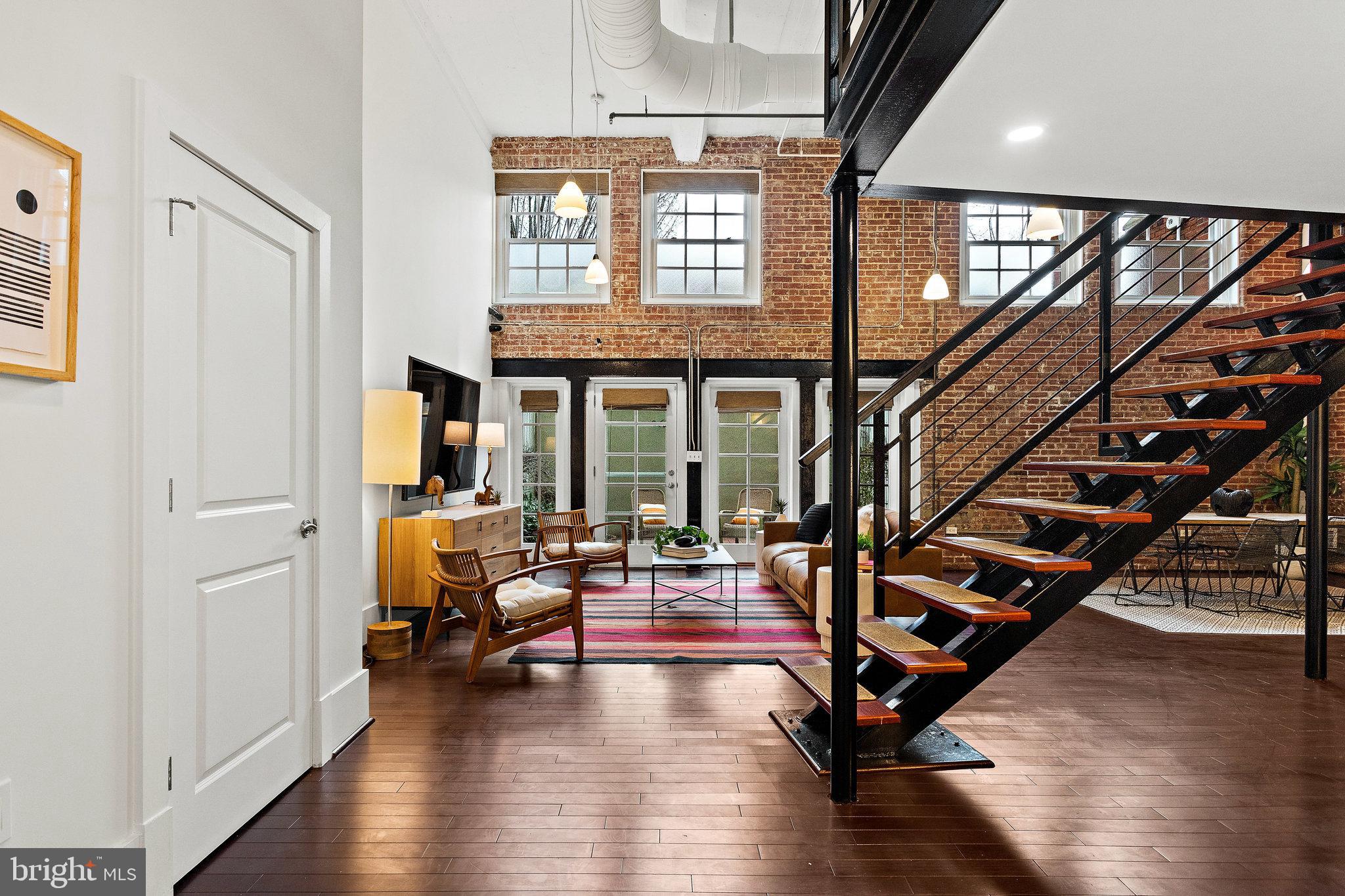 1315 Independence Avenue Southeast, Unit 8 Washington, DC 20003 - Photo 7 of 43 Entry foyer opens to 2 story living space + patio
