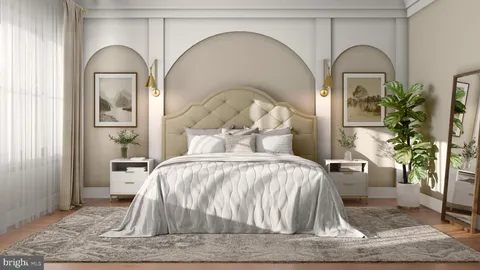 a bedroom with a bed and a potted plant on the table