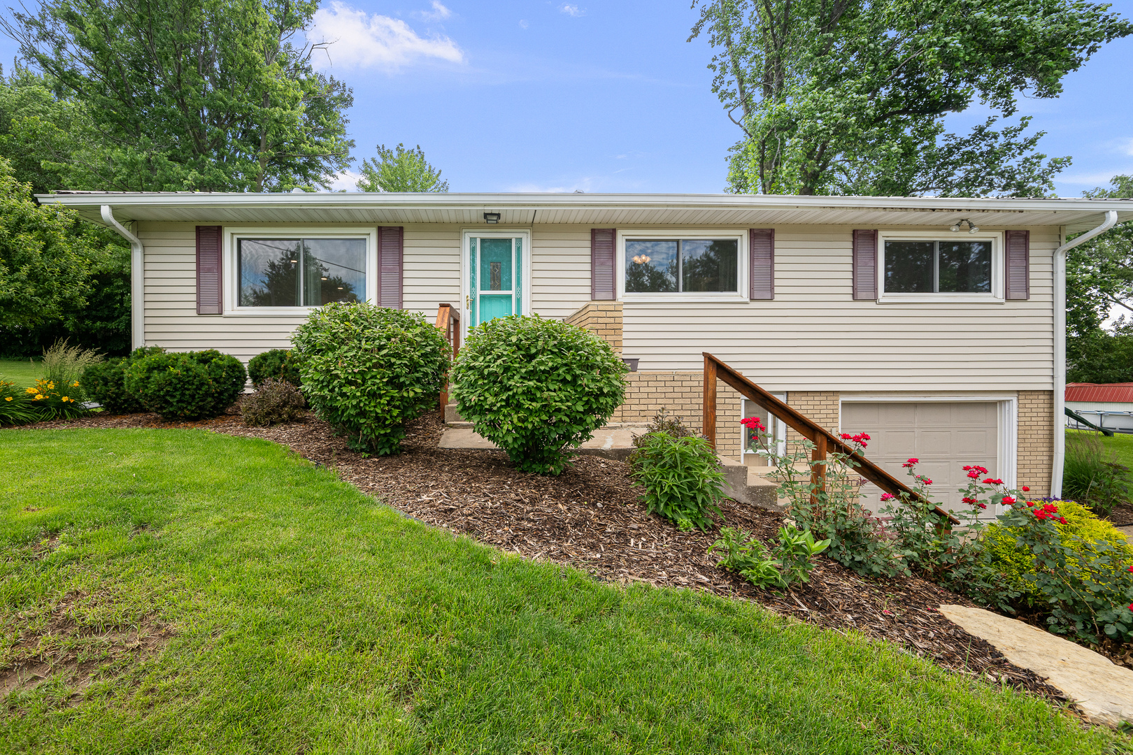 506 Bush Street Reynolds, IL 61279 - Photo 36 of 37 a view of an house with backyard space and garden