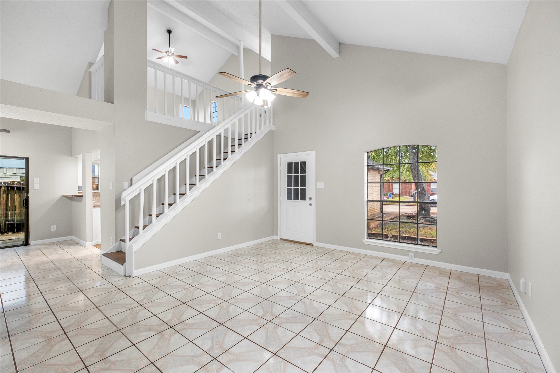 20066 Moonflower Lane Katy, TX 77449 - Photo 4 of 20 a view interior of a house with an entryway and chandelier fan
