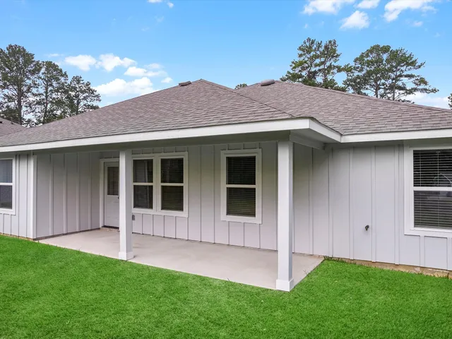 a view of a house with a garden