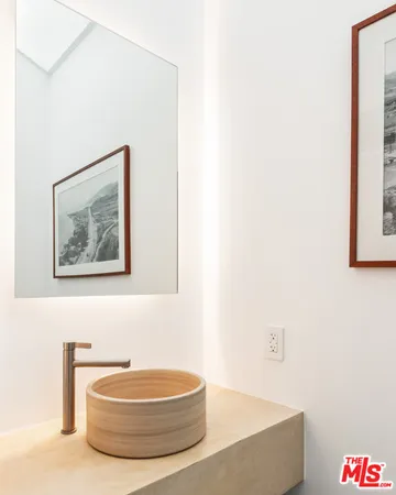 a bathroom with a tub and a shower