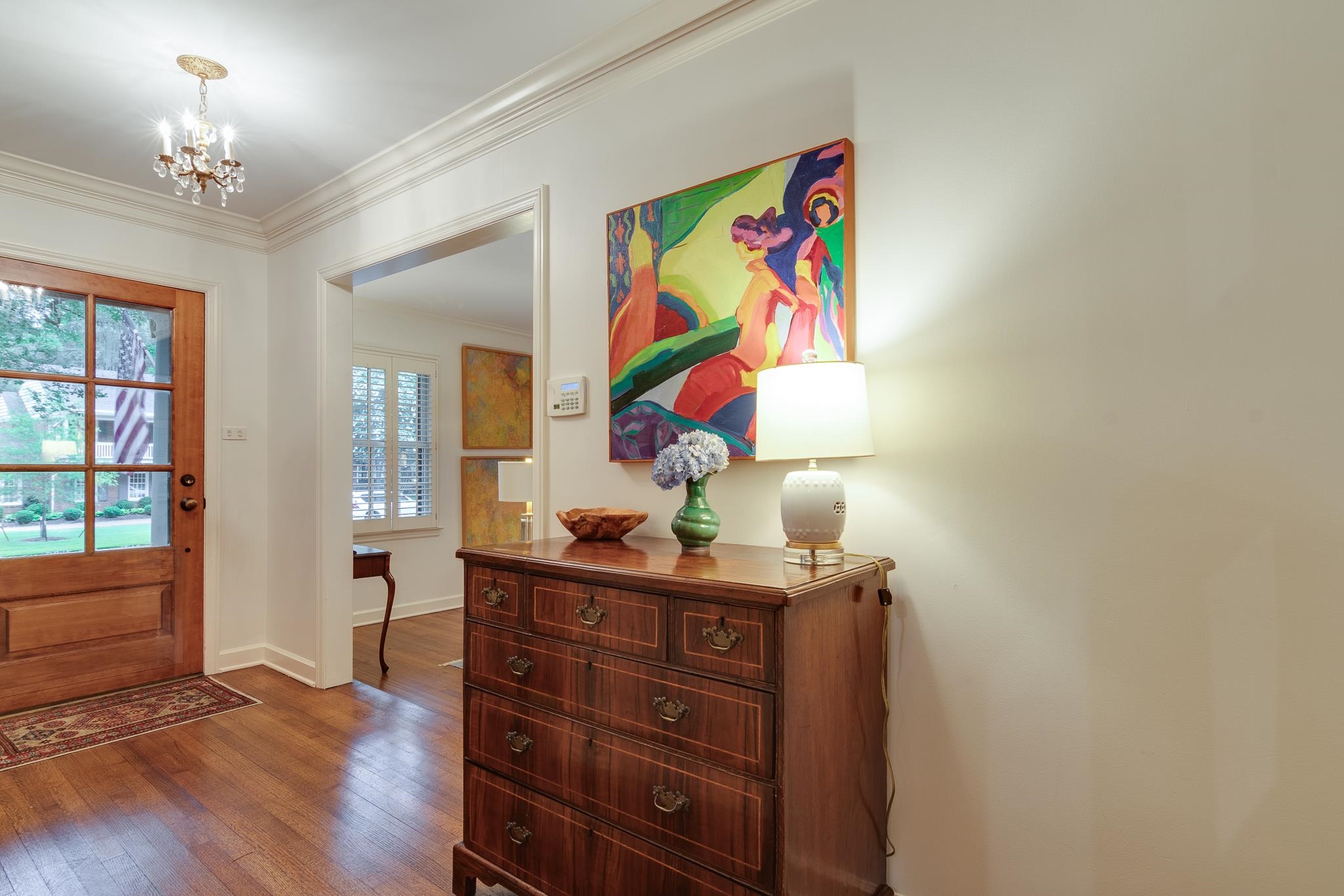 59 Lombardy Road Memphis, TN 38111 - Photo 3 of 26 a living room with furniture and paintings on the wall