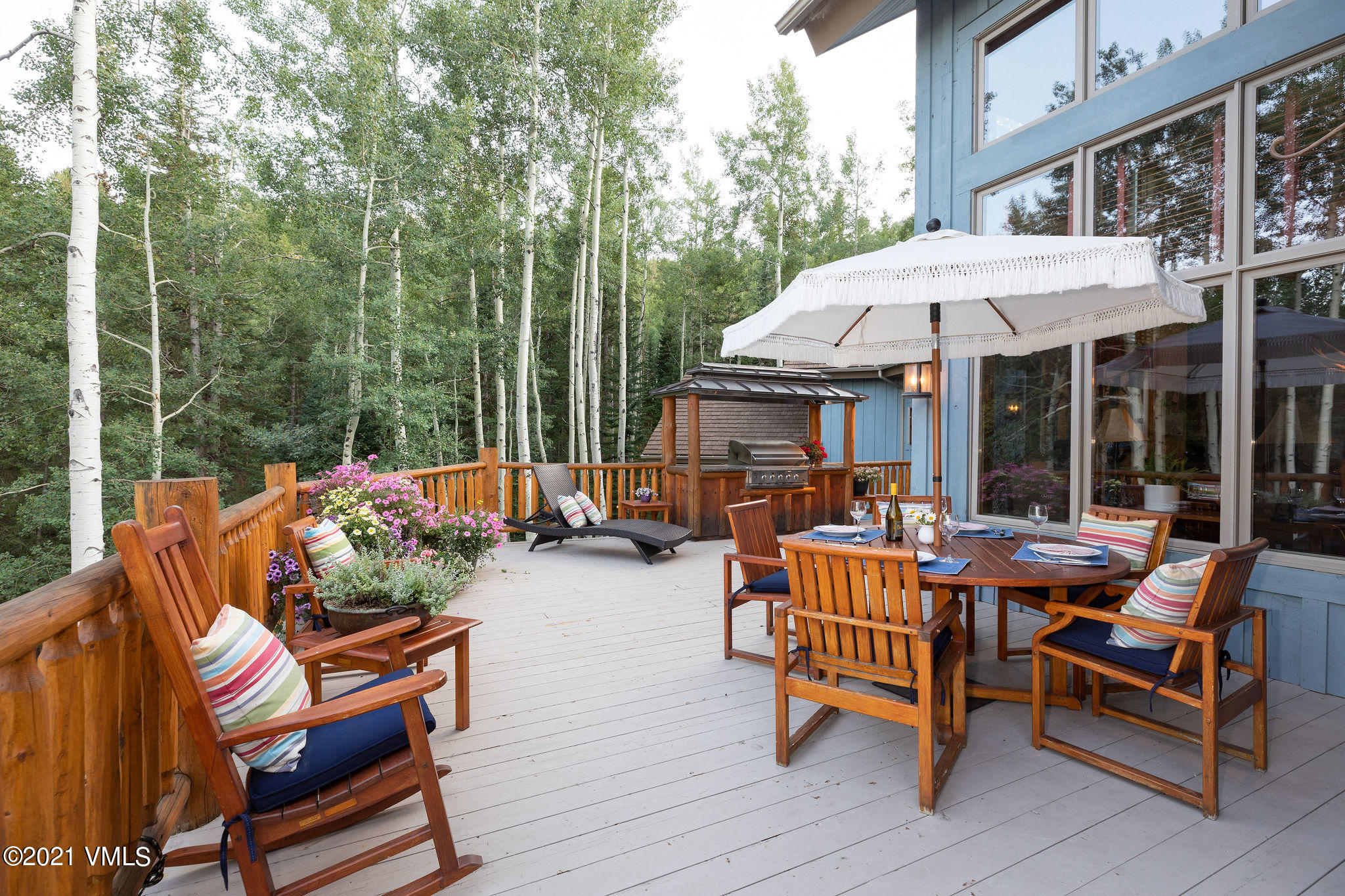 575 Pilgrim Drive Edwards, CO 81632 - Photo 11 of 20 a backyard of a house with barbeque oven table and chairs