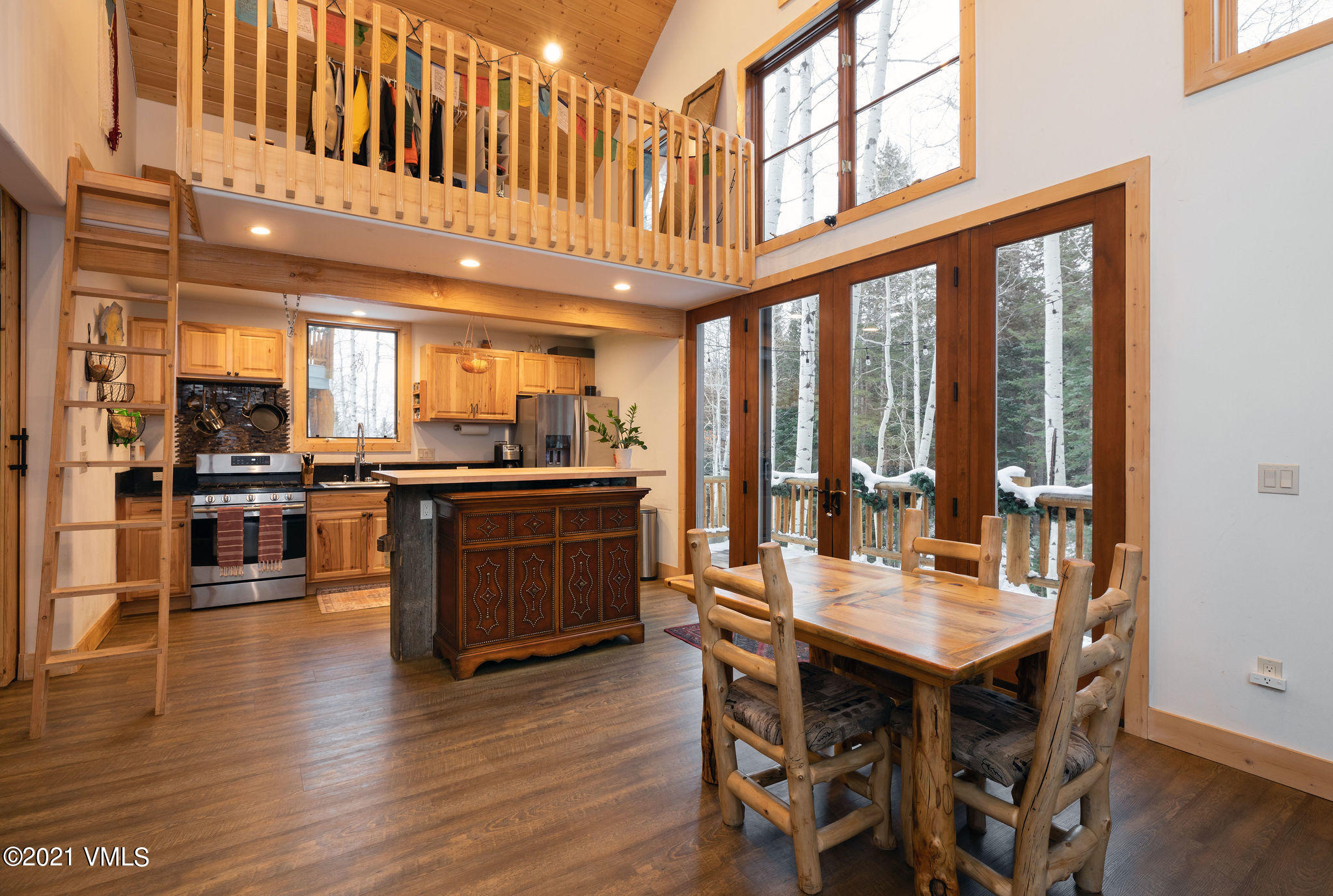 575 Pilgrim Drive Edwards, CO 81632 - Photo 14 of 20 a kitchen with a table chairs stove and kitchen view