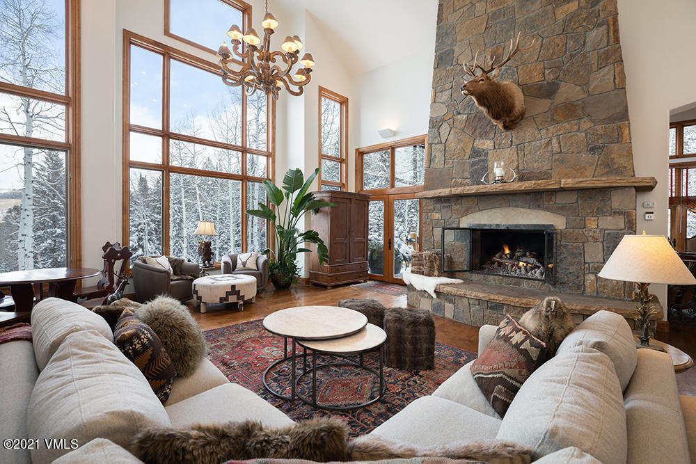 575 Pilgrim Drive Edwards, CO 81632 - Photo 2 of 20 a living room with furniture and a fireplace