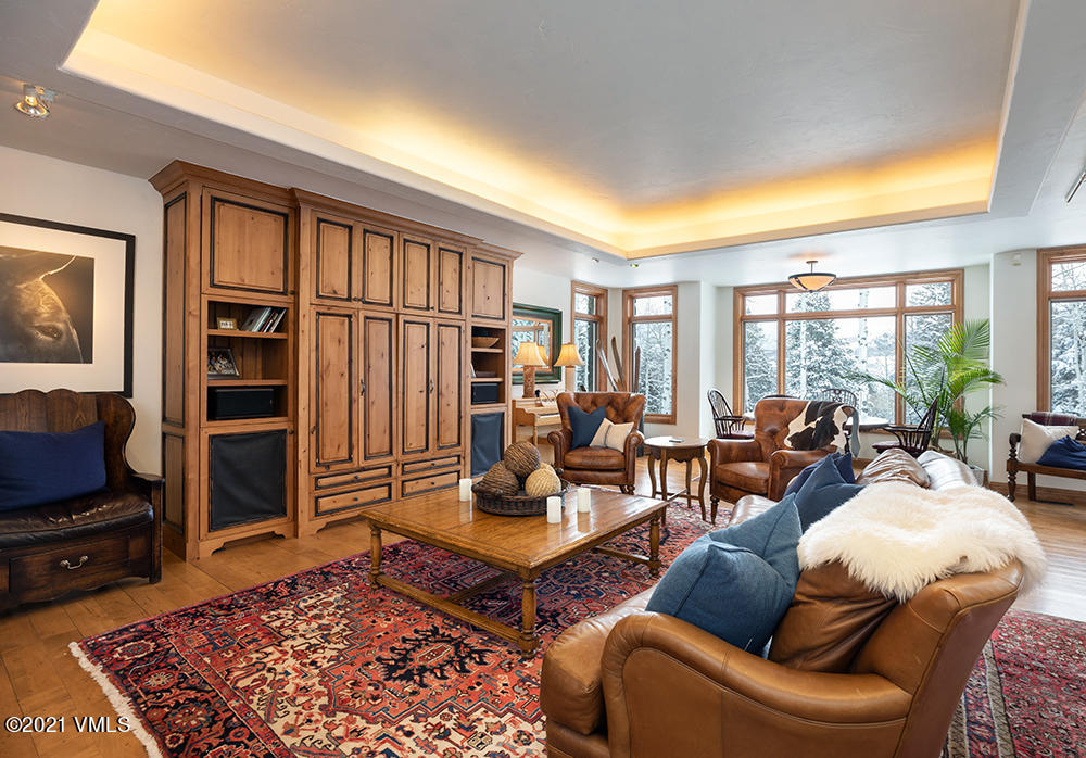 575 Pilgrim Drive Edwards, CO 81632 - Photo 5 of 20 a living room with furniture ceiling fan and a rug