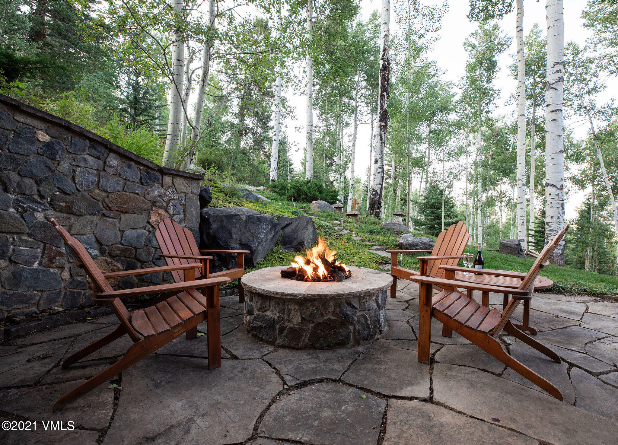 575 Pilgrim Drive Edwards, CO 81632 - Photo 10 of 20 a backyard of a house with yard fire pit and outdoor seating