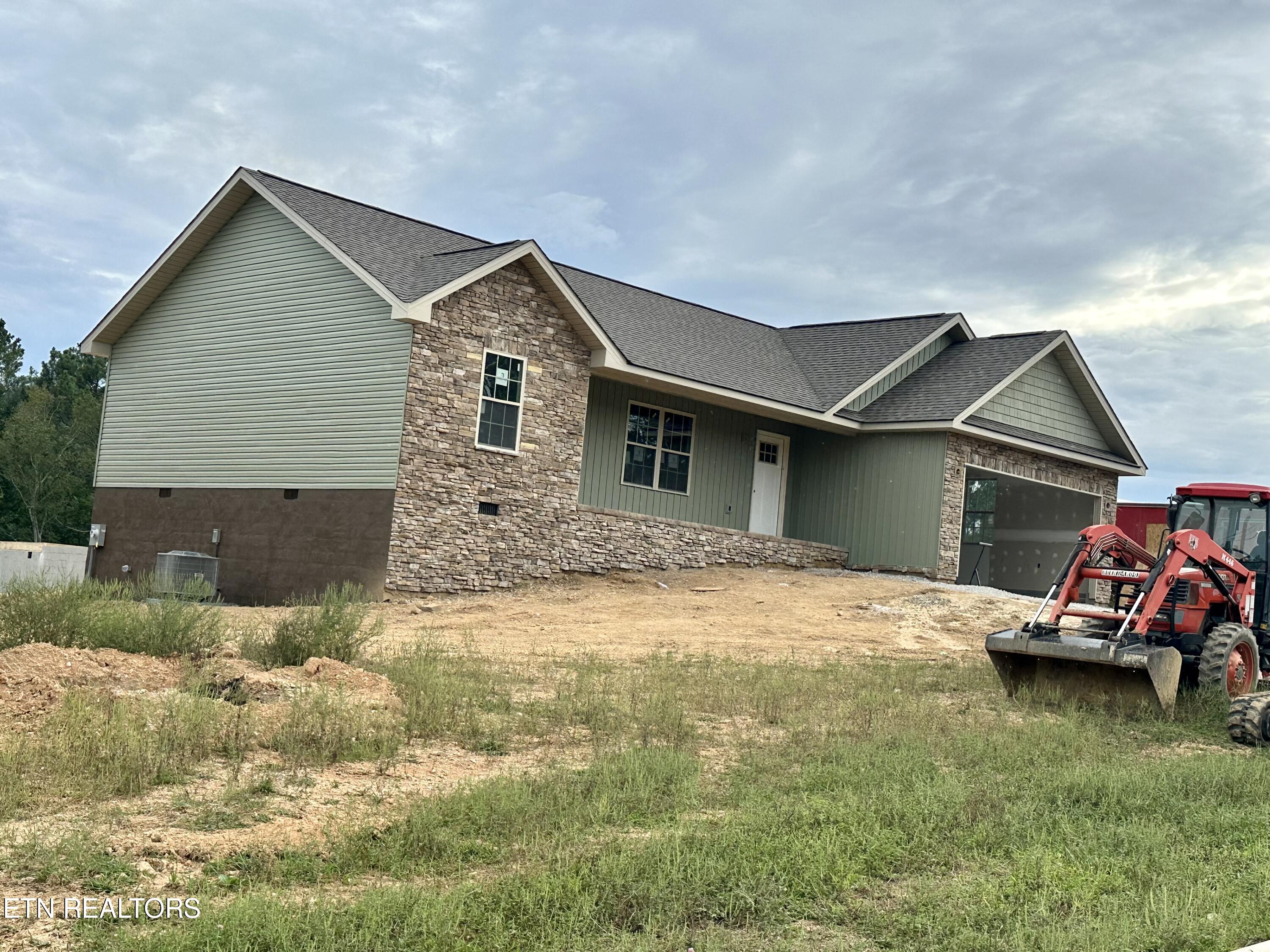 115 Milo Circle Tazewell, TN 37879 - Photo 3 of 5 3DE38992-1F8A-464D-A208-37FA820AF273