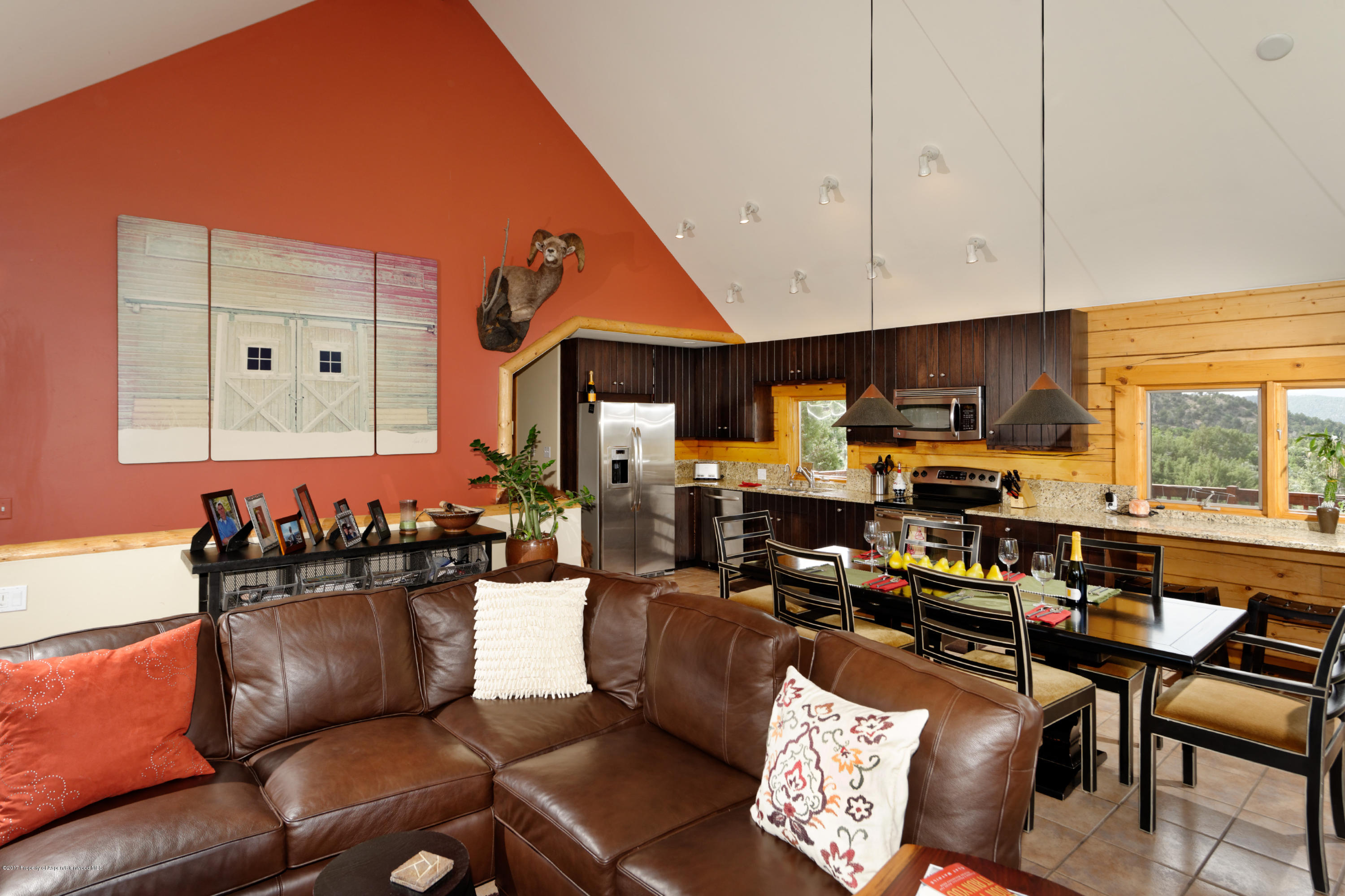 1436 Hooks Spur Road Basalt, CO 81621 - Photo 11 of 21 a living room with furniture kitchen view and a window