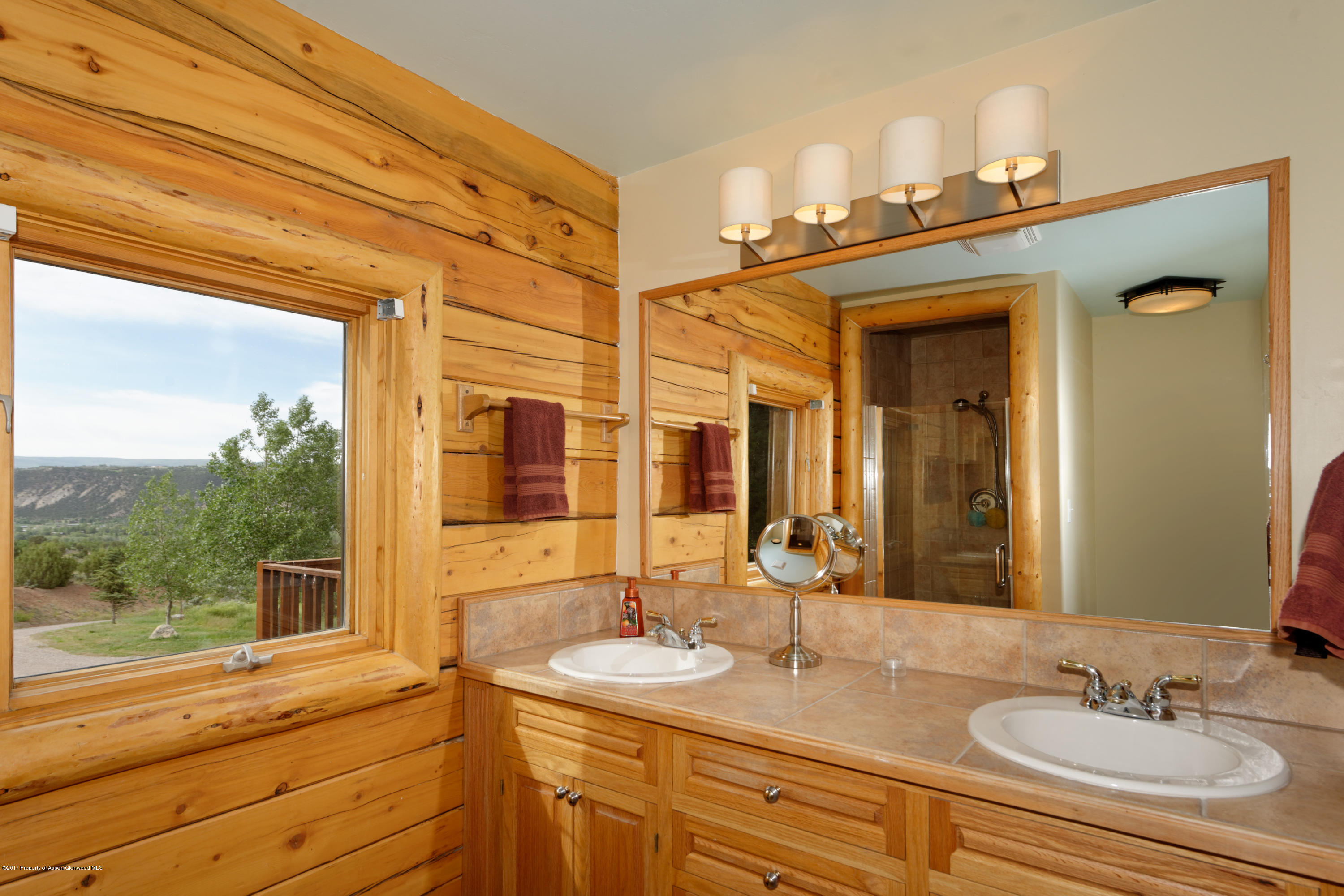 1436 Hooks Spur Road Basalt, CO 81621 - Photo 13 of 21 a bathroom with a sink double vanity and a mirror